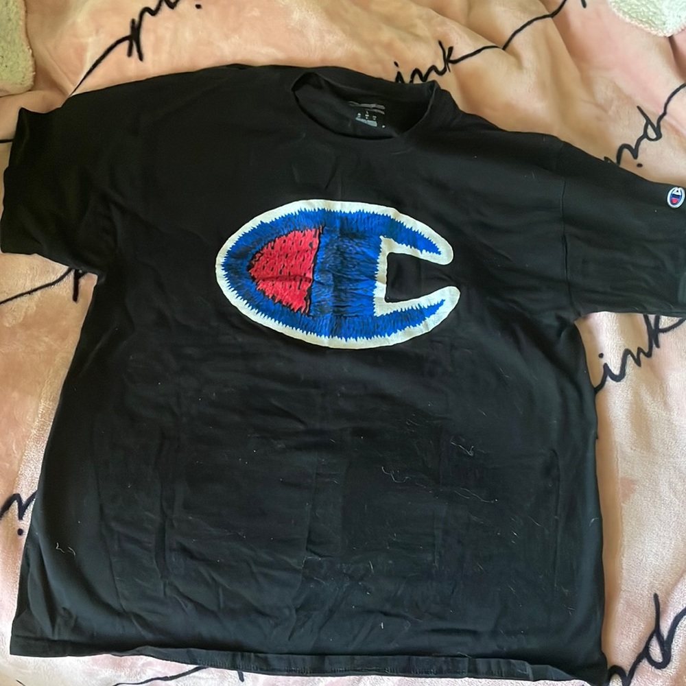 champion t-shirt! black with red white and blue champion logo in the middle